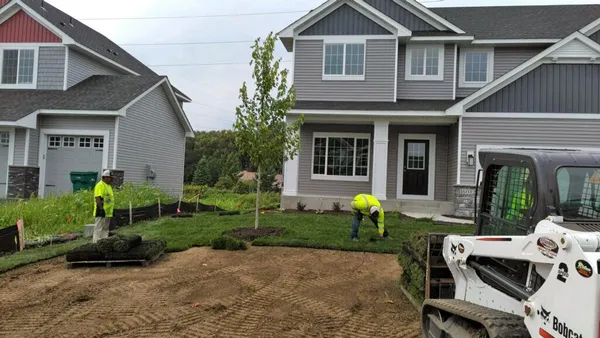 Ristau crew installing sod at a new construction property