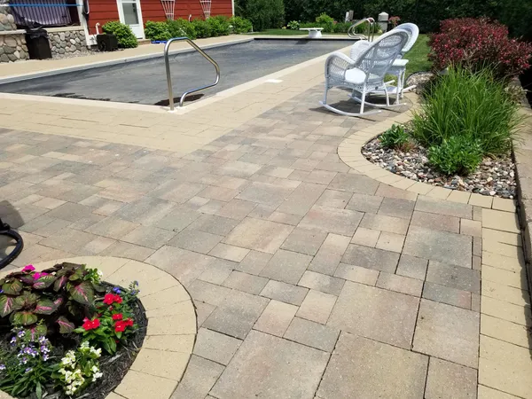 Completed paver patio and pool surround installation